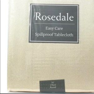 New WOT table cloth 70” diameter round. Liquids bead up on for and easy clean up